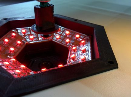 Uplooking camera with LED array mounted to table.